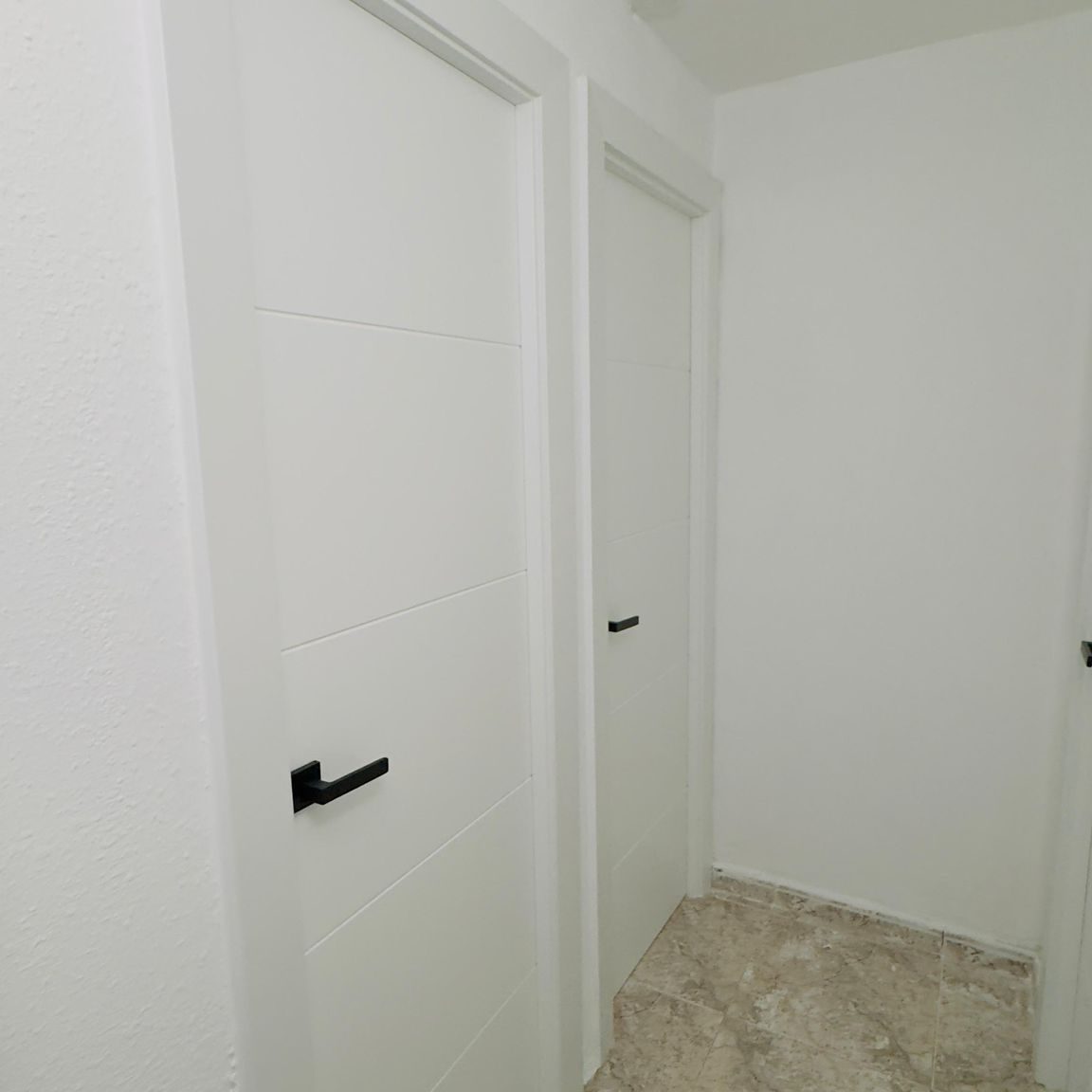 cambio de puertas en l´hospitalet para Eduardo y Miriam 3