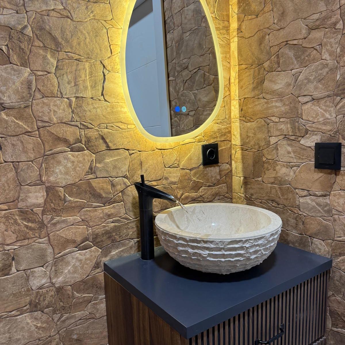 Baño empedrado en Granollers