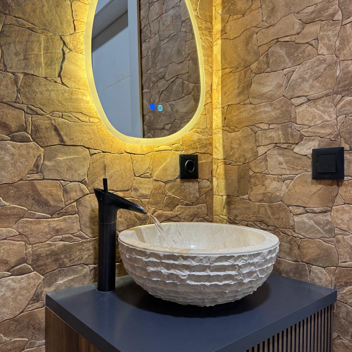 Baño empedrado en Granollers