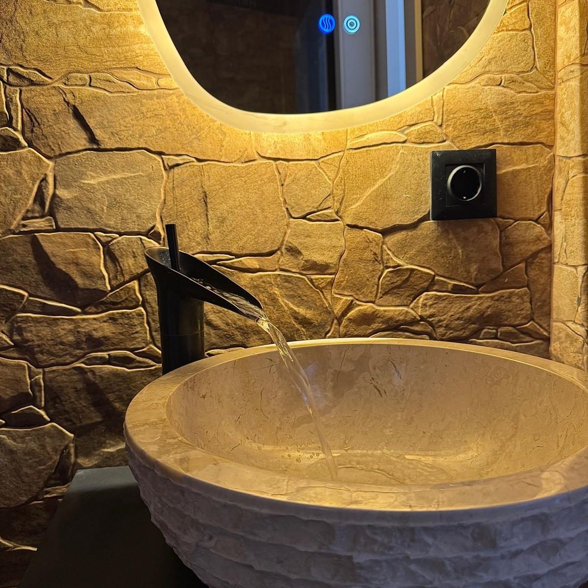 Baño empedrado en Granollers