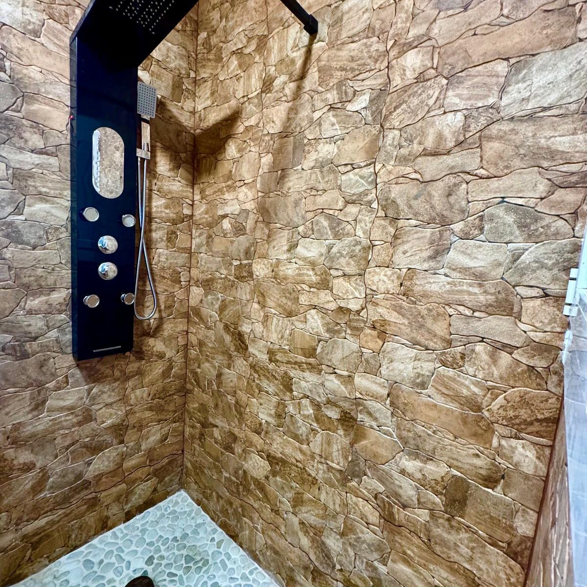 Baño empedrado en Granollers