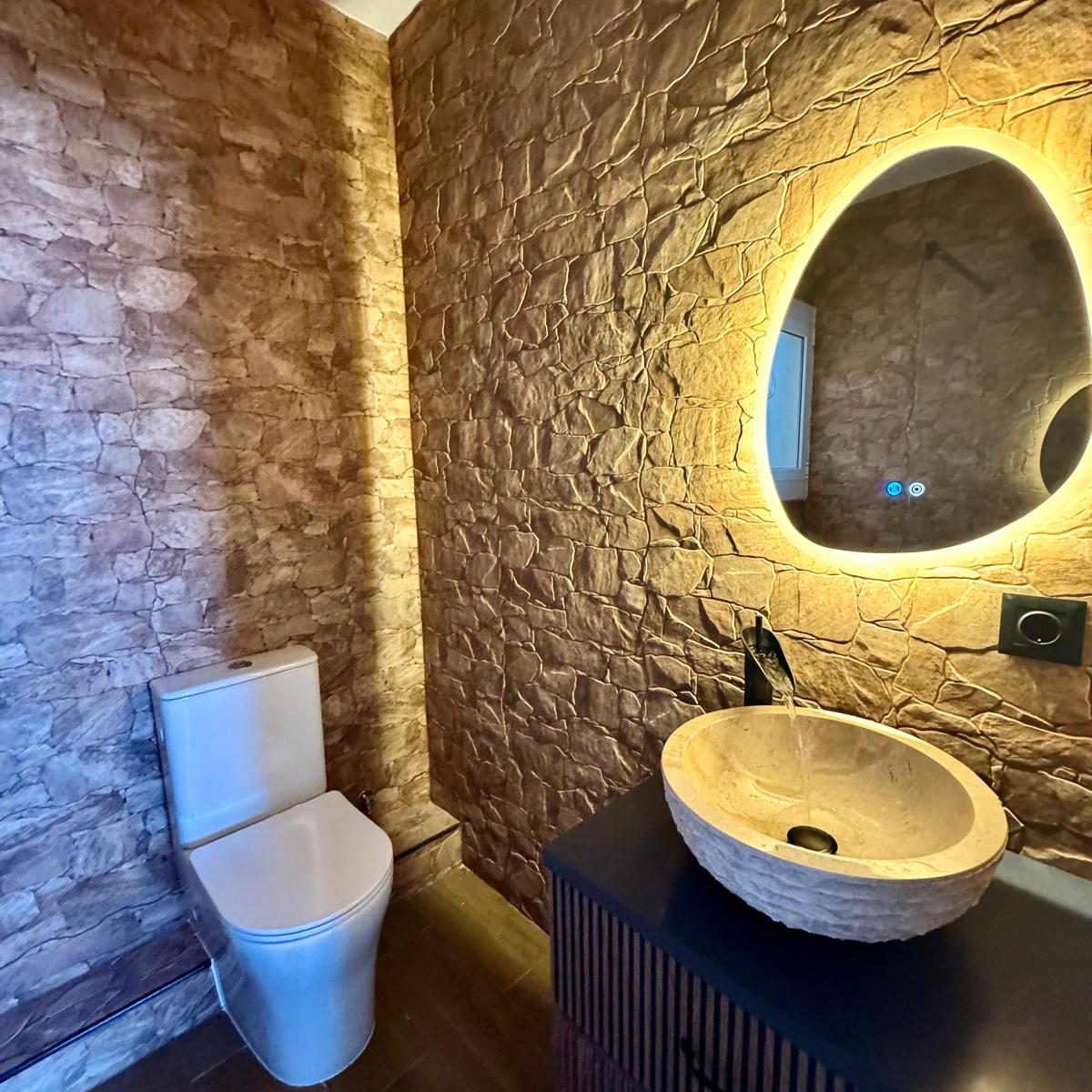 Baño empedrado en Granollers