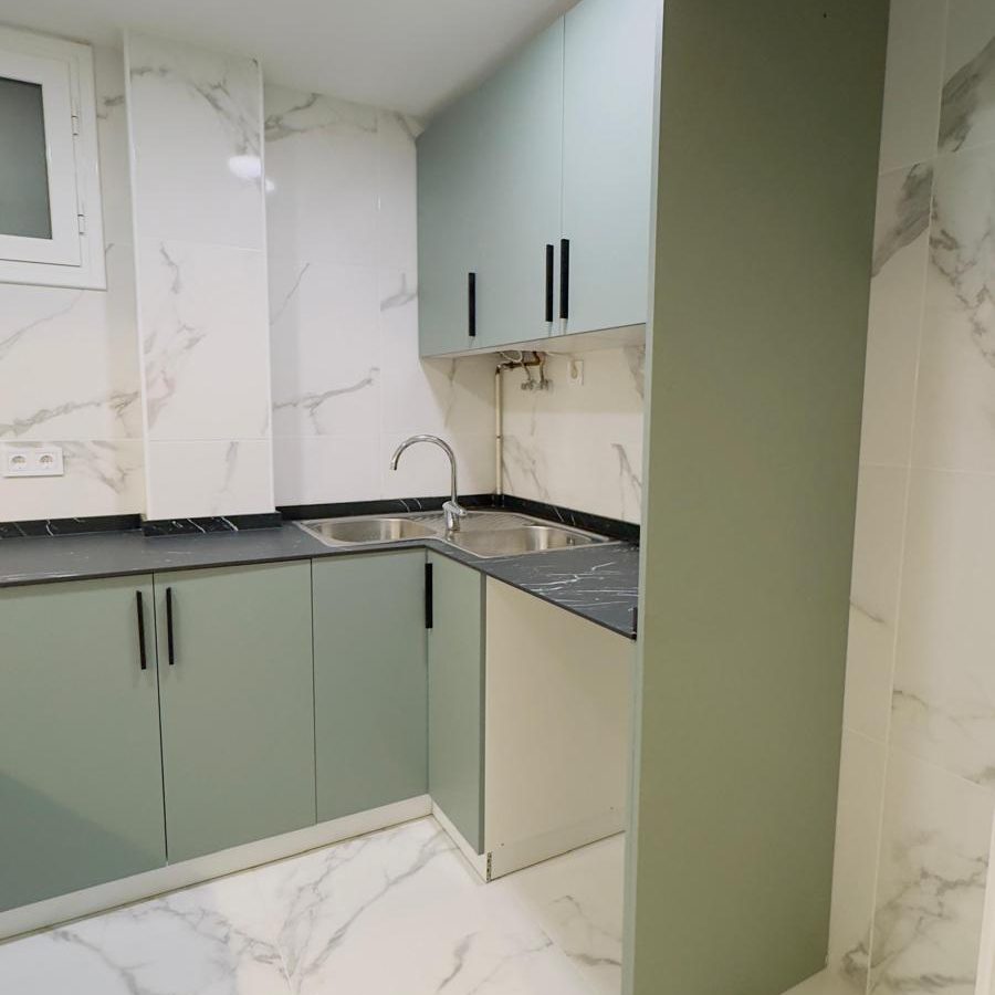 Cocina mobiliario verde selva